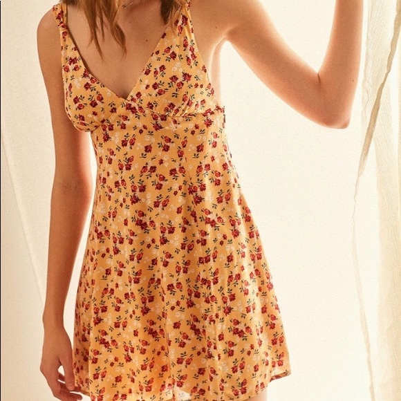 Urban Outfitters Dresses & Skirts - Urban outfitters yellow floral dress